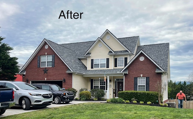 Two-story brick home after a new roof