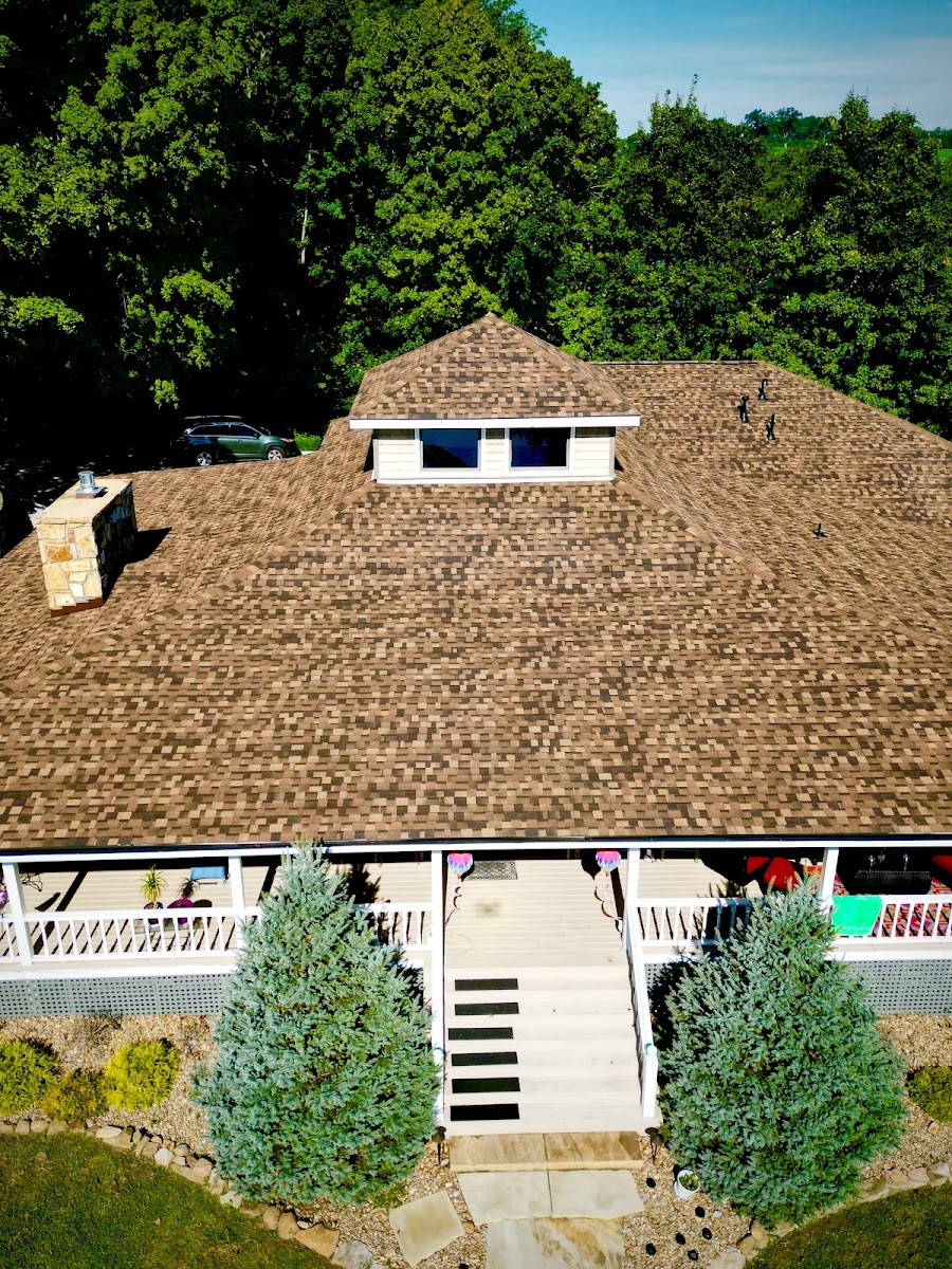 Home with new roof and wraparound porch